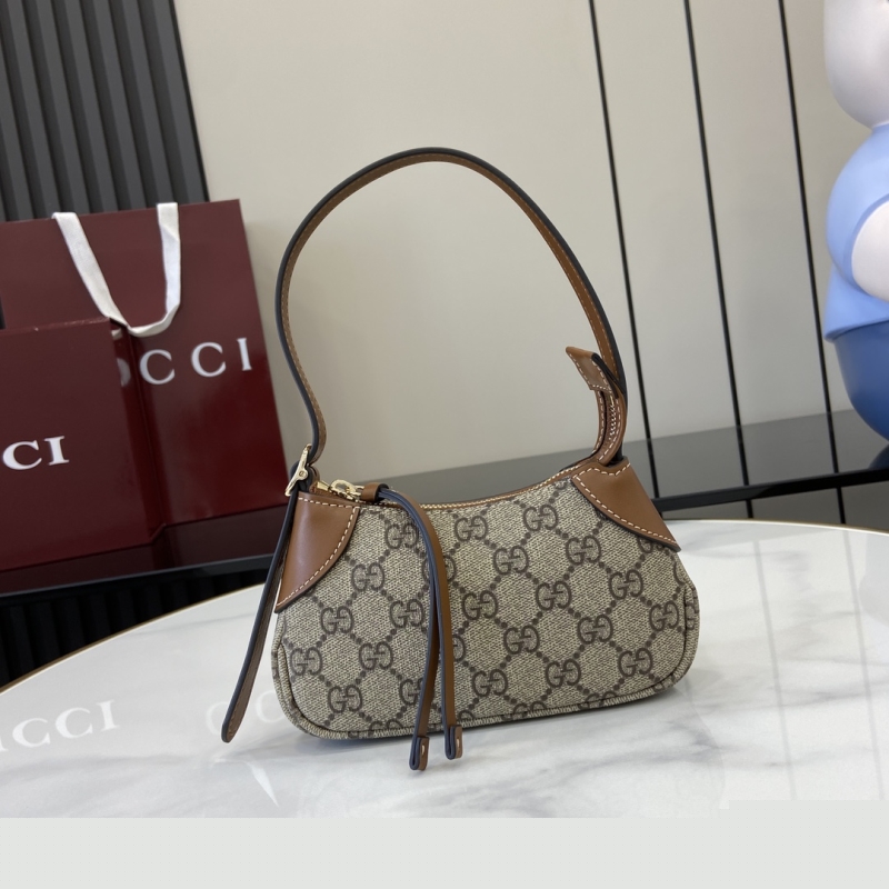 G*u*i top handle bags